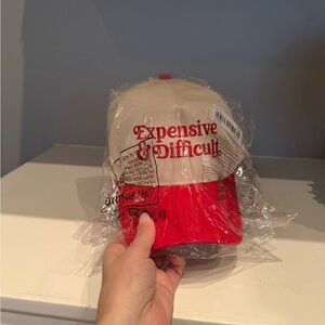 Red and Beige Cap with Embroidered Text